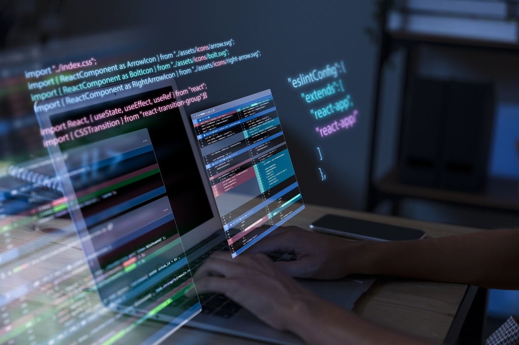 programming-background-with-person-working-with-codes-computer.jpg